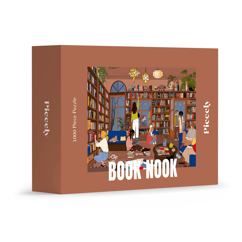 Book Nook 1000-piece jigsaw puzzle by Piecely, featuring a cozy library with people reading and a raccoon on a bookshelf. Ett mysigt pussel för vuxna med boktema.