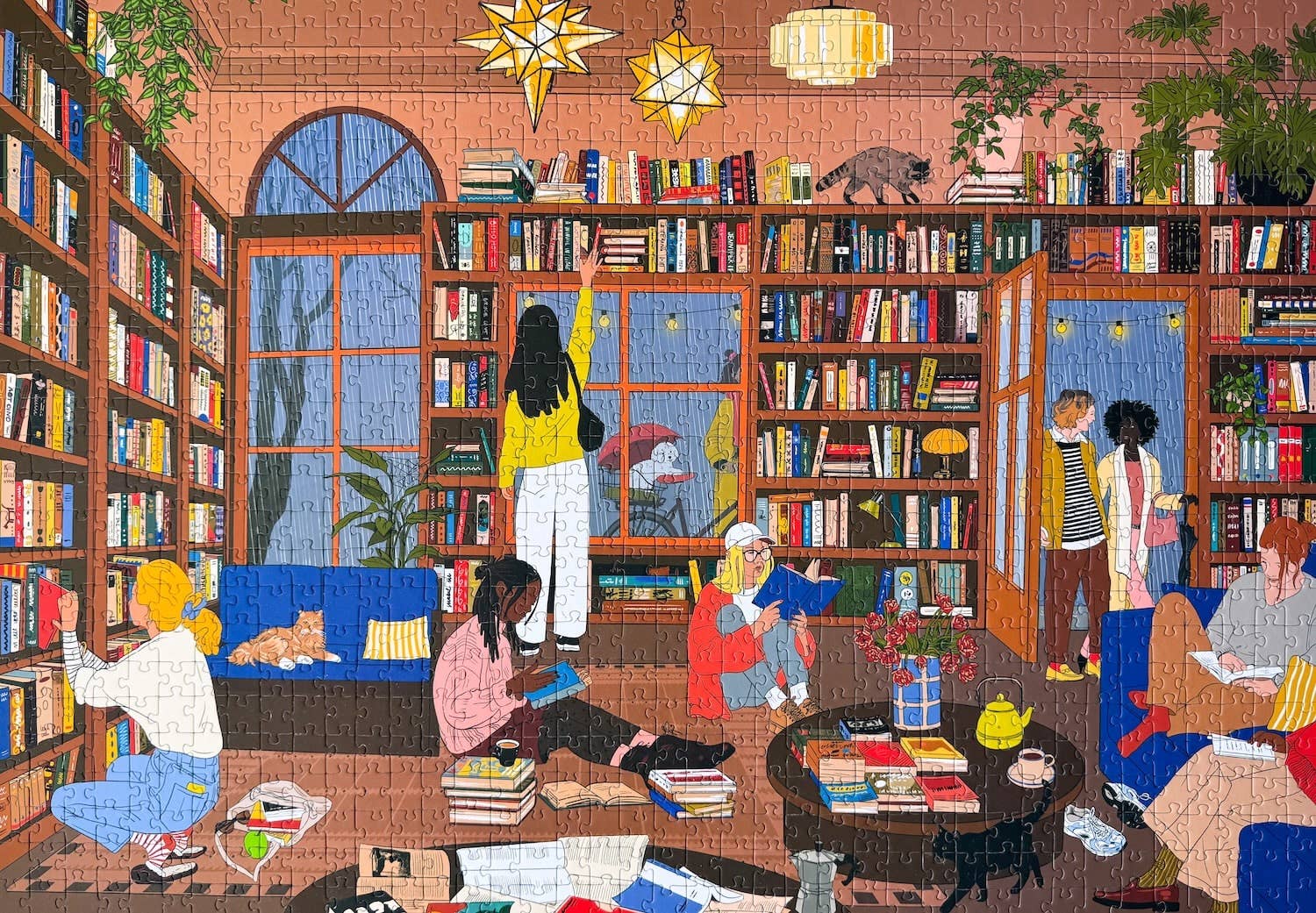 Book Nook jigsaw puzzle completed featuring an illustration of a cozy library with people reading and interacting.