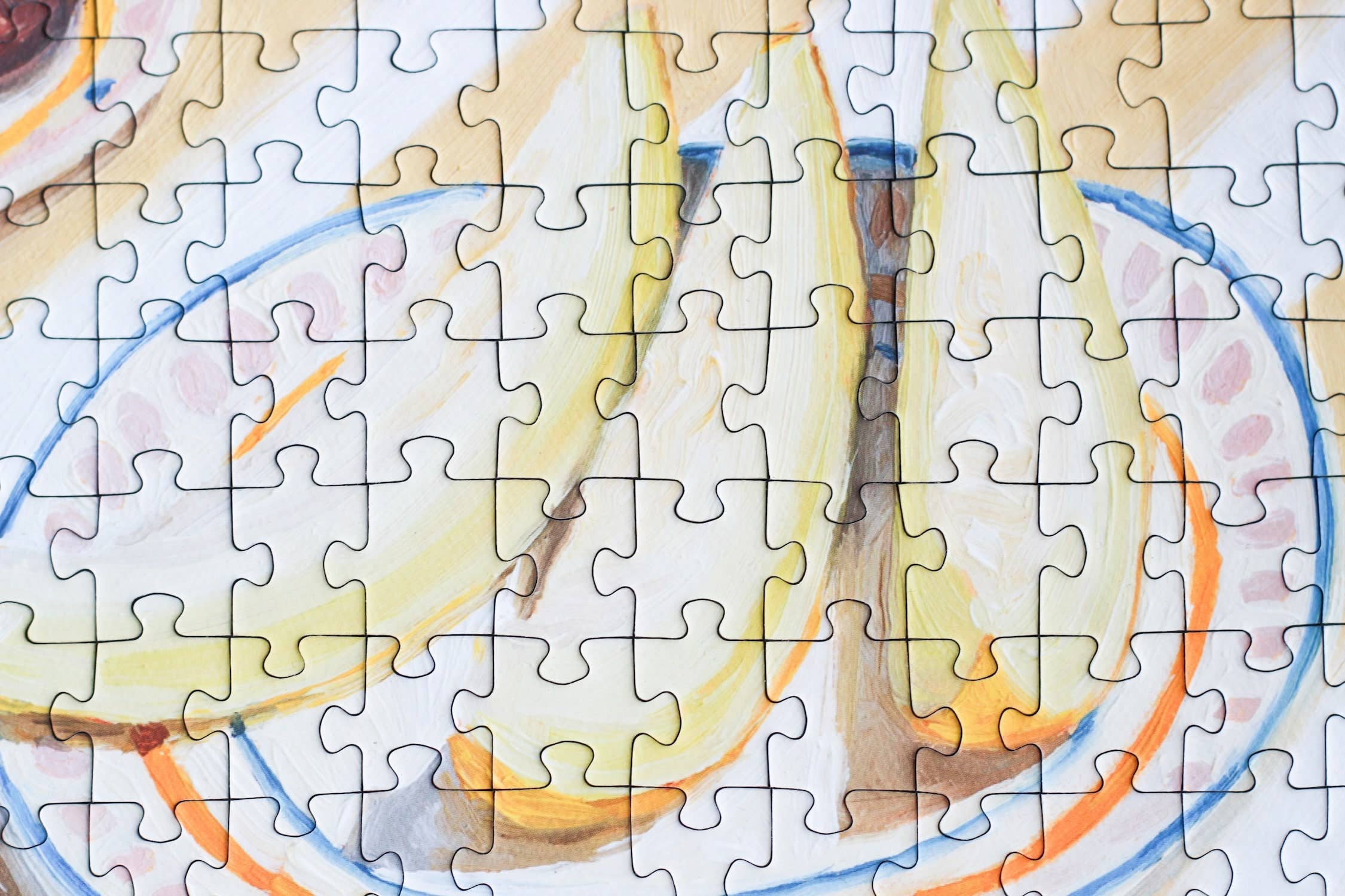 La Dolce Vita jigsaw puzzle close up of a section detail featuring a plate with fruit slices.