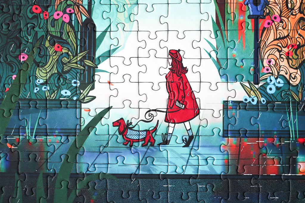 Midnight Walk jigsaw puzzle completed section featuring a woman dressed in red walking her dog.