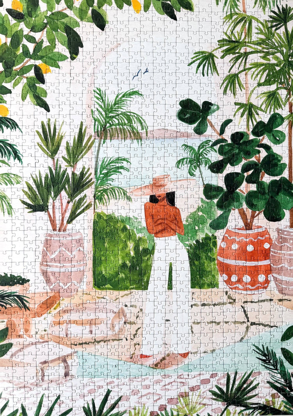 Peaceful Morocco jigsaw puzzle complete with illustration of a woman posing around plants and cozy view.