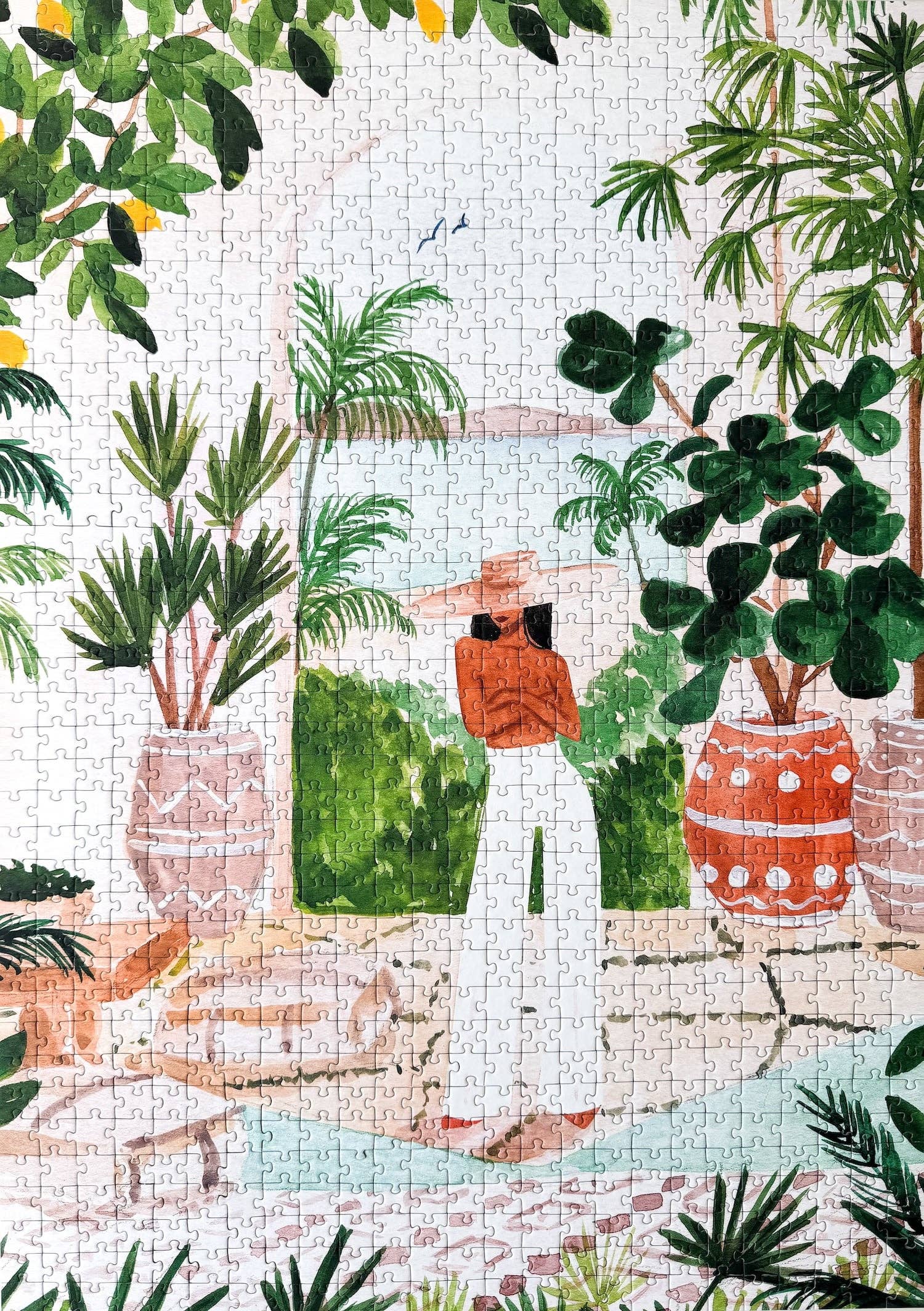 Peaceful Morocco jigsaw puzzle complete with illustration of a woman posing around plants and cozy view.