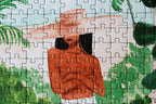 Peaceful Morocco jigsaw puzzle close up showing detail of woman wearing a hat.