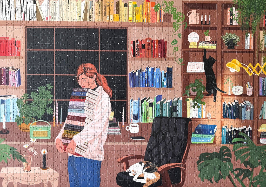 Reading Room puzzle completed, featuring a woman standing in a cozy room with bookshelves and cats.