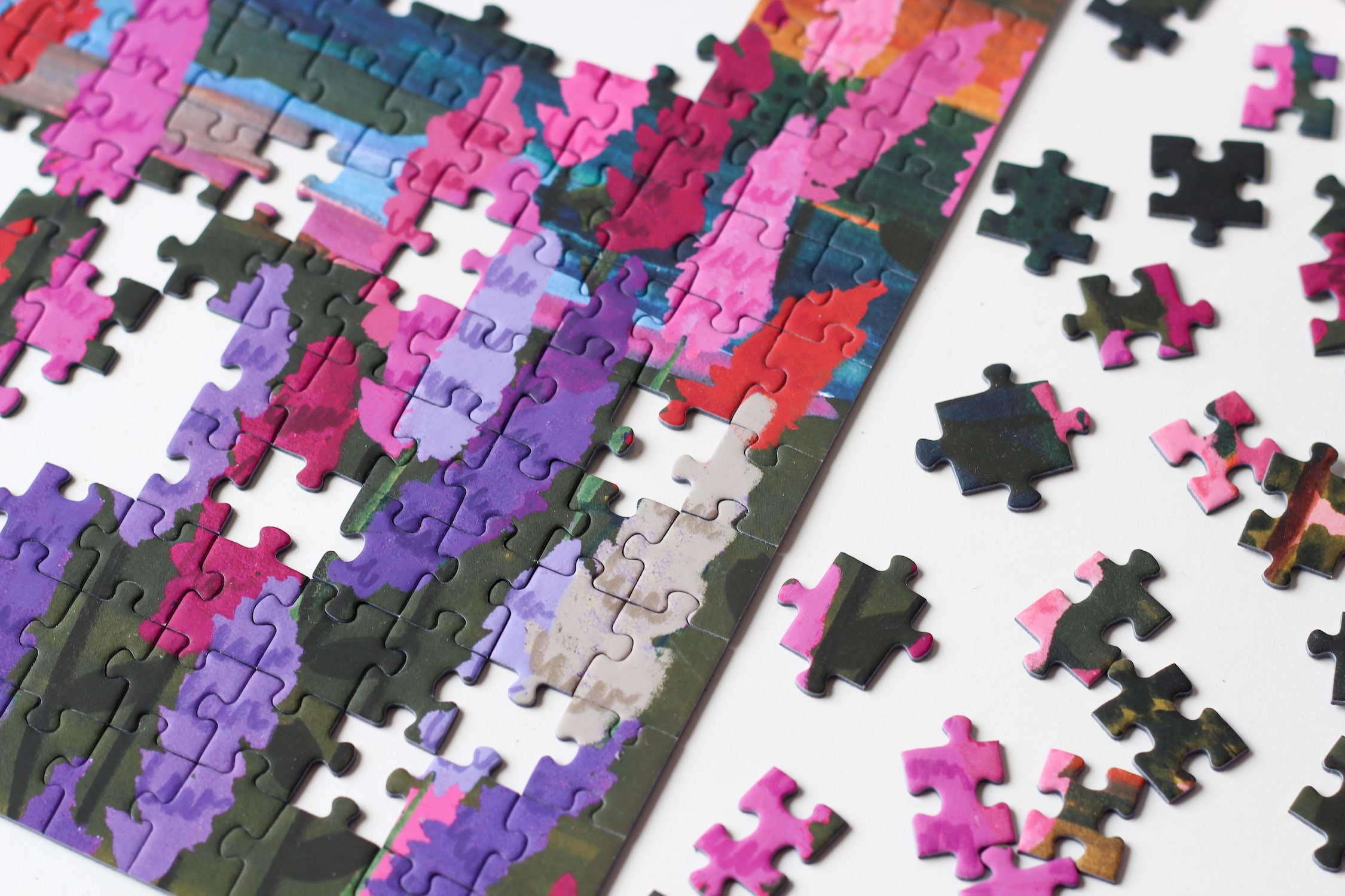 Van Life jigsaw puzzle partially completed with edge close up.